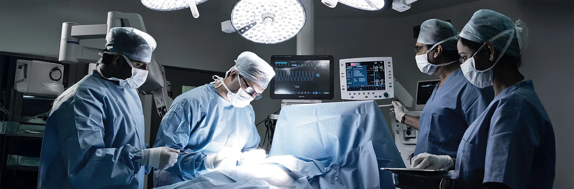 Surgeon and hospital care team preparing for a patient consultation